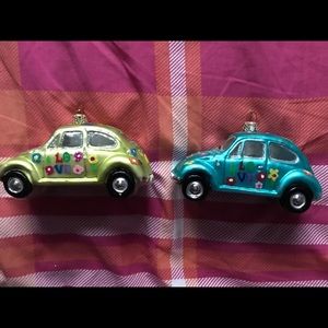 Two RETIRED Christopher Radko VW ornaments.